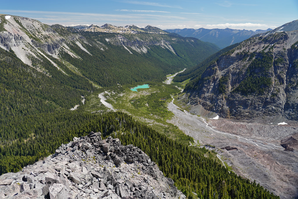 Looking down the end of the east ridge of Mt Ruth on the Emmons Moraine Lake and the Emmons Glacier terminus